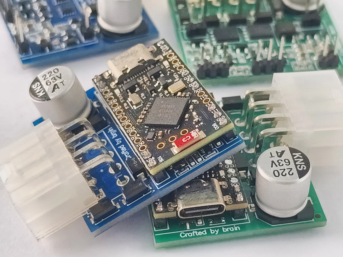 Several EasyRide circuit-board assemblies on the workbench