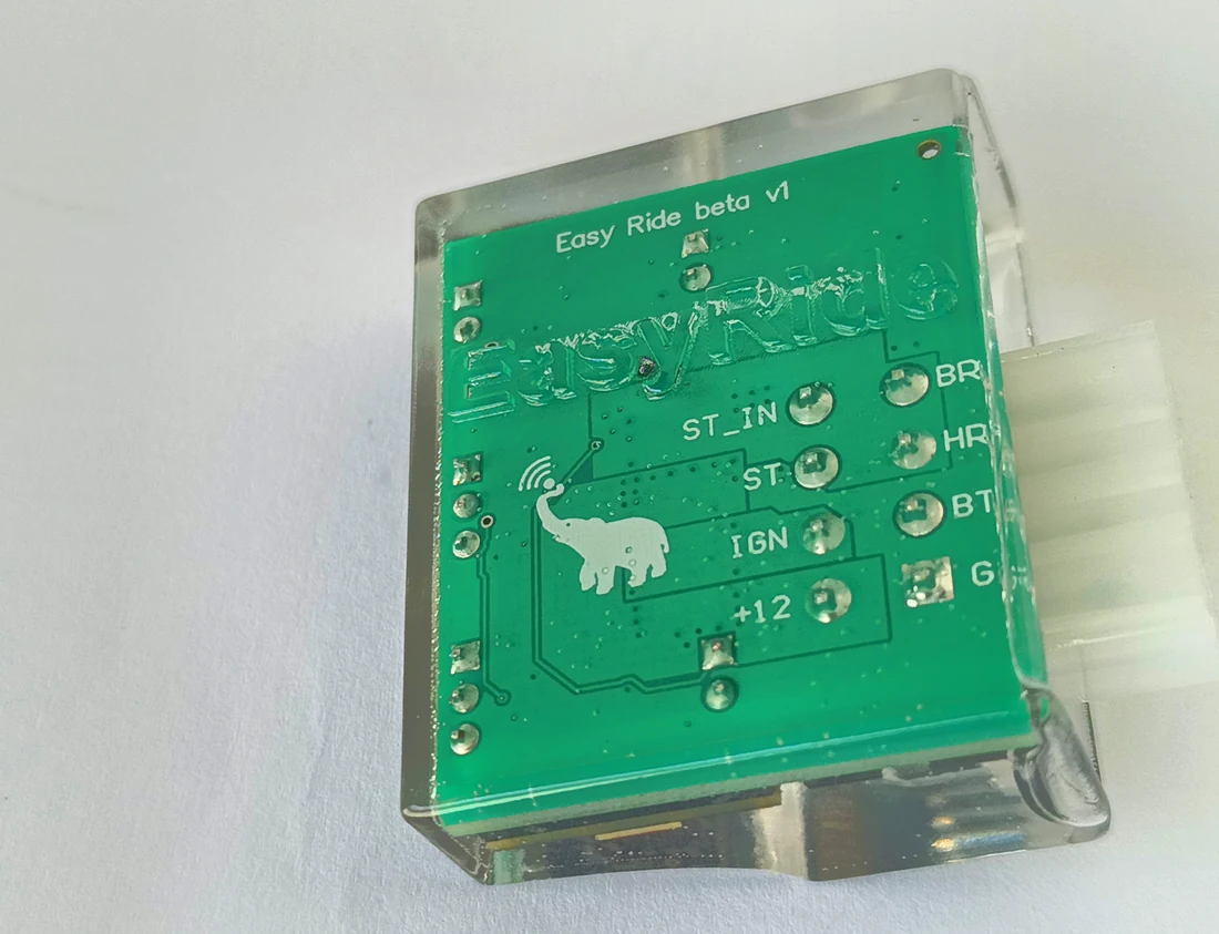 Underside of the EasyRide beta v1 board in a transparent enclosure, with labelled wiring connections
