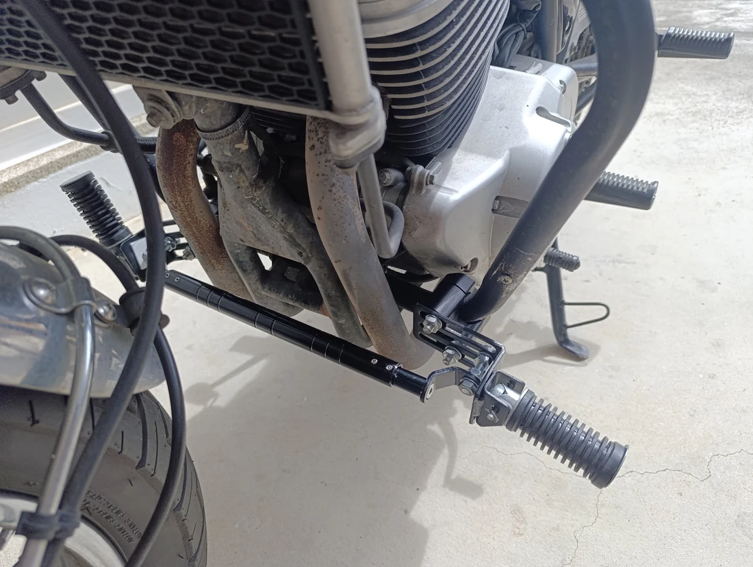 Additional forward footpegs and cross brace mounted ahead of the engine on my GPX 250 Twin