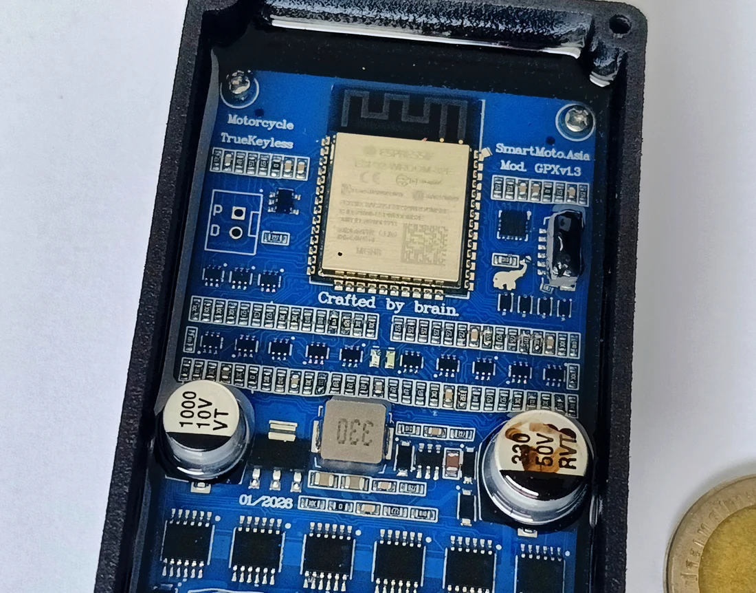 TrueKeylessGPX circuit board mounted inside its open black enclosure